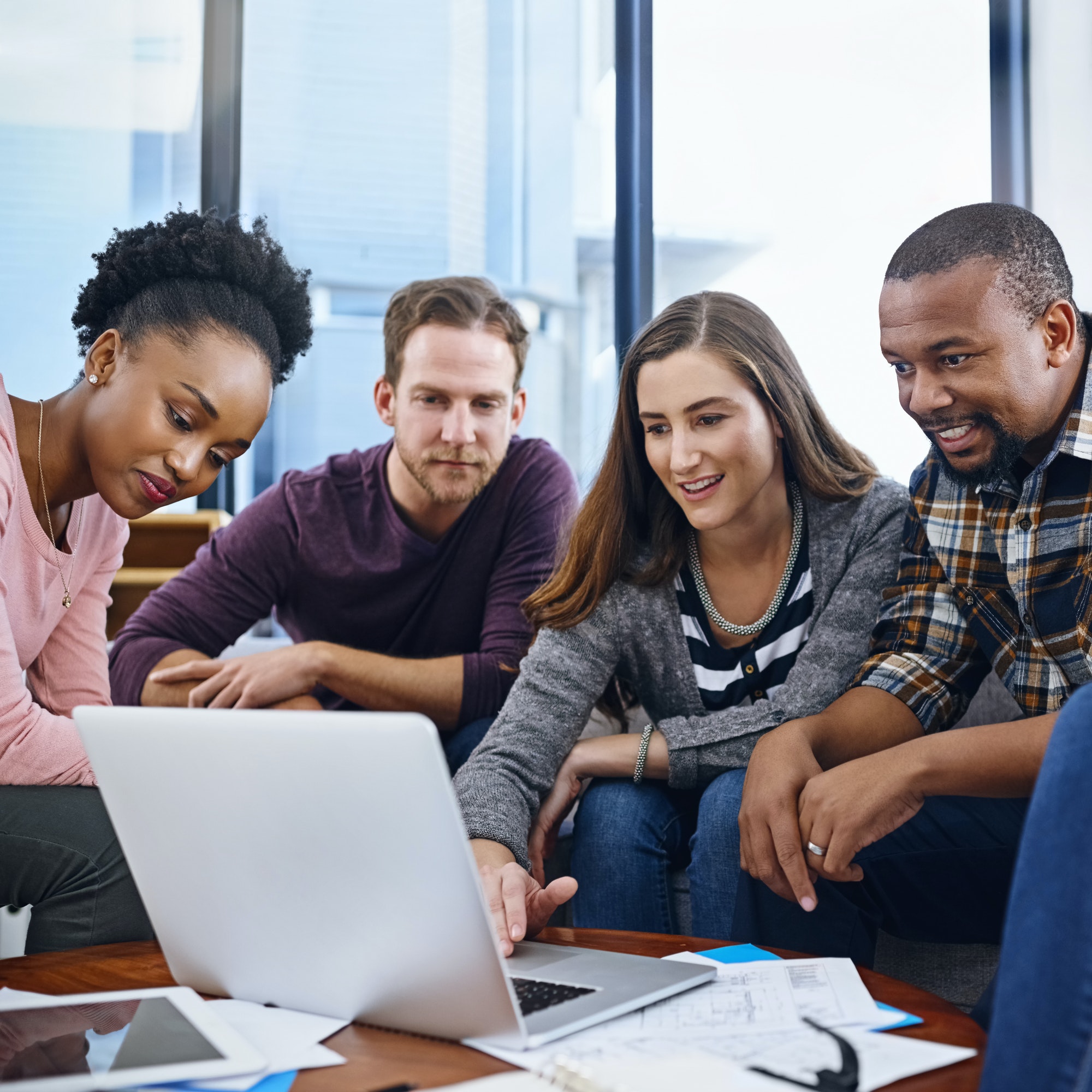 Cropped shot of a team of designers working together in the office